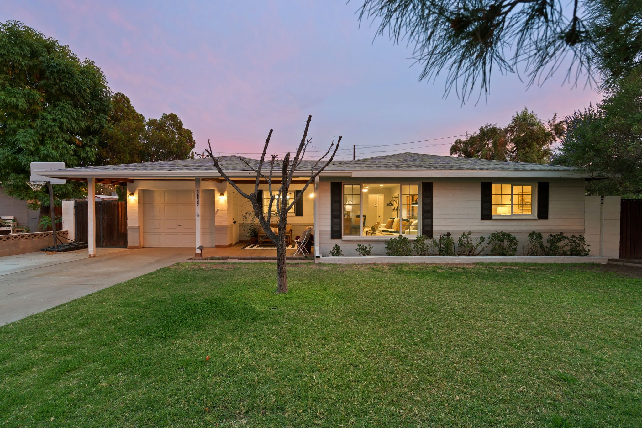 3839 E Vernon Ave in Phoenix, Arizona at twilight, a home listed and staged by Lynda Redding