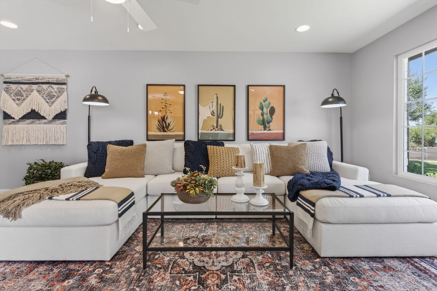 The living room at 3839 E Vernon Ave in Phoenix, staged by Lynda Redding with her own furnishings